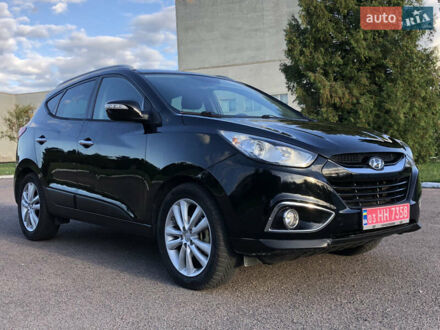 Черный Хендай их35, объемом двигателя 2 л и пробегом 189 тыс. км за 12999 $, фото 1 на Automoto.ua
