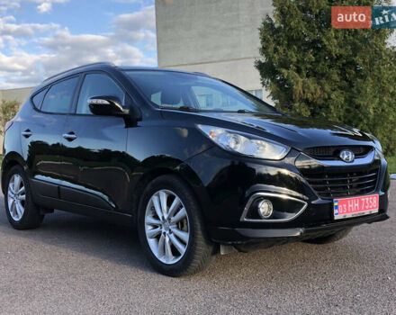 Чорний Хендай іх35, об'ємом двигуна 2 л та пробігом 189 тис. км за 12999 $, фото 1 на Automoto.ua