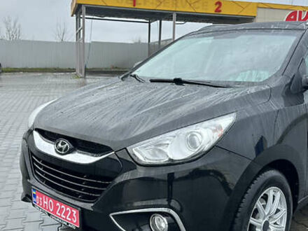 Чорний Хендай іх35, об'ємом двигуна 2 л та пробігом 181 тис. км за 13500 $, фото 1 на Automoto.ua