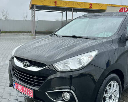 Чорний Хендай іх35, об'ємом двигуна 2 л та пробігом 181 тис. км за 13500 $, фото 1 на Automoto.ua