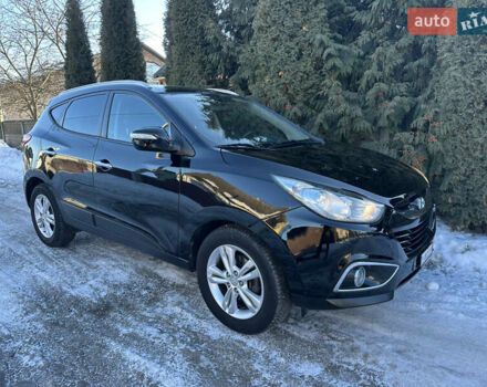 Чорний Хендай іх35, об'ємом двигуна 2 л та пробігом 186 тис. км за 13300 $, фото 1 на Automoto.ua