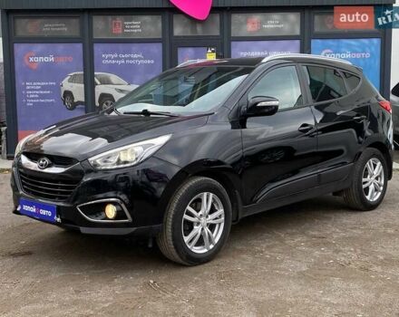 Чорний Хендай іх35, об'ємом двигуна 1.69 л та пробігом 194 тис. км за 12500 $, фото 1 на Automoto.ua