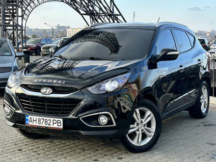 Чорний Хендай іх35, об'ємом двигуна 2 л та пробігом 241 тис. км за 14400 $, фото 1 на Automoto.ua