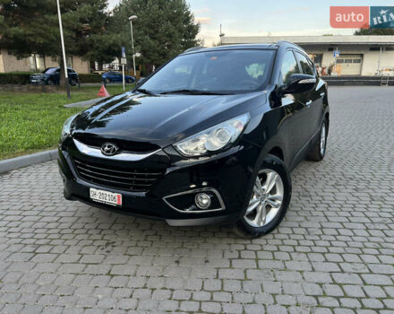 Чорний Хендай іх35, об'ємом двигуна 2 л та пробігом 175 тис. км за 13900 $, фото 1 на Automoto.ua