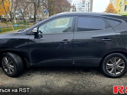 Черный Хендай их35, объемом двигателя 2 л и пробегом 152 тыс. км за 13000 $, фото 1 на Automoto.ua