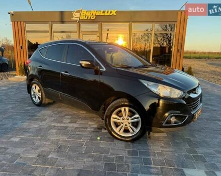 Чорний Хендай іх35, об'ємом двигуна 2 л та пробігом 178 тис. км за 12699 $, фото 1 на Automoto.ua