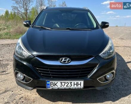 Черный Хендай их35, объемом двигателя 1.6 л и пробегом 55 тыс. км за 9499 $, фото 1 на Automoto.ua