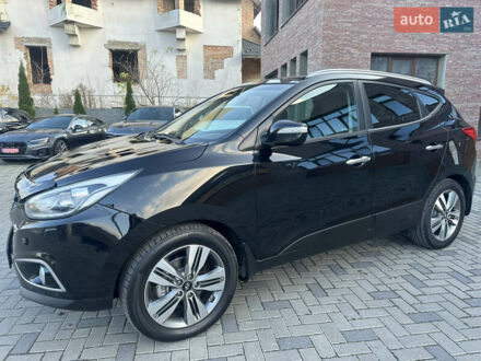 Чорний Хендай іх35, об'ємом двигуна 2 л та пробігом 230 тис. км за 13400 $, фото 1 на Automoto.ua