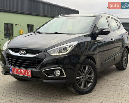 Чорний Хендай іх35, об'ємом двигуна 2 л та пробігом 240 тис. км за 15499 $, фото 1 на Automoto.ua