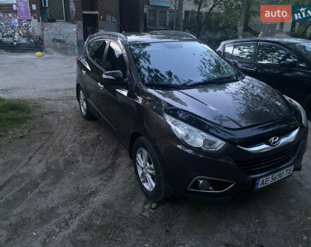 Коричневый Хендай их35, объемом двигателя 2 л и пробегом 240 тыс. км за 10000 $, фото 1 на Automoto.ua