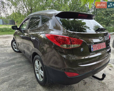 Коричневий Хендай іх35, об'ємом двигуна 2 л та пробігом 263 тис. км за 11200 $, фото 2 на Automoto.ua