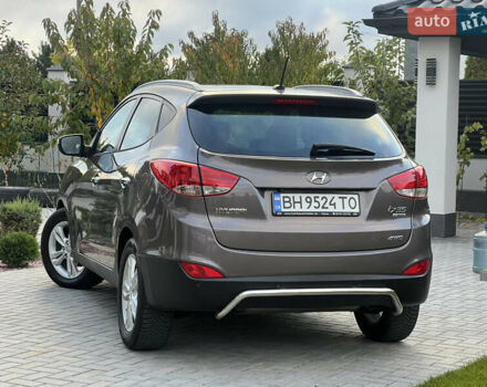 Коричневый Хендай их35, объемом двигателя 2 л и пробегом 136 тыс. км за 13999 $, фото 23 на Automoto.ua