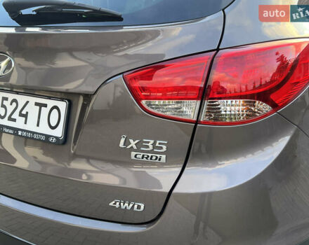 Коричневый Хендай их35, объемом двигателя 2 л и пробегом 136 тыс. км за 13999 $, фото 17 на Automoto.ua