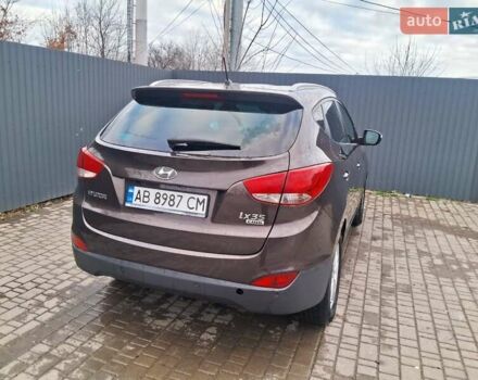 Коричневый Хендай их35, объемом двигателя 1.7 л и пробегом 309 тыс. км за 11500 $, фото 1 на Automoto.ua