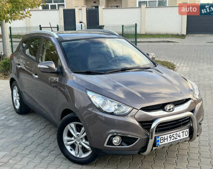 Коричневый Хендай их35, объемом двигателя 2 л и пробегом 136 тыс. км за 13999 $, фото 6 на Automoto.ua