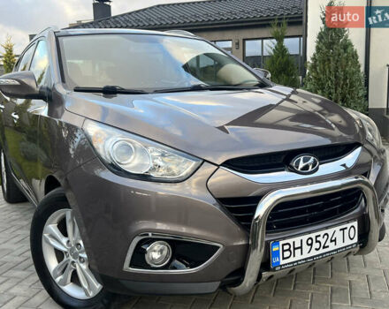 Коричневый Хендай их35, объемом двигателя 2 л и пробегом 136 тыс. км за 13999 $, фото 22 на Automoto.ua