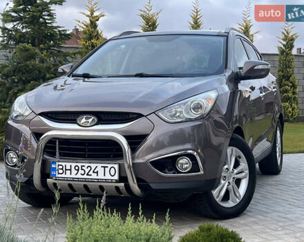 Коричневый Хендай их35, объемом двигателя 2 л и пробегом 136 тыс. км за 13999 $, фото 36 на Automoto.ua