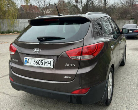 Коричневый Хендай их35, объемом двигателя 2 л и пробегом 180 тыс. км за 12300 $, фото 3 на Automoto.ua