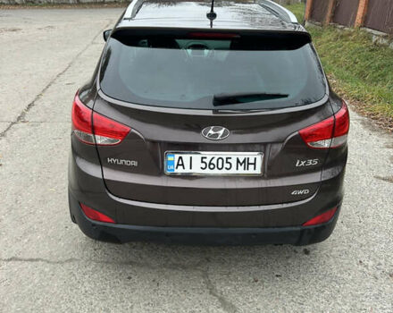 Коричневый Хендай их35, объемом двигателя 2 л и пробегом 180 тыс. км за 12300 $, фото 5 на Automoto.ua