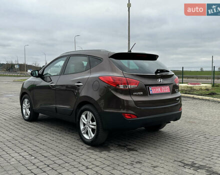 Коричневый Хендай их35, объемом двигателя 2 л и пробегом 209 тыс. км за 12200 $, фото 17 на Automoto.ua