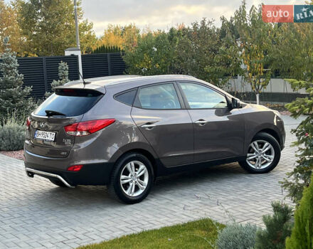 Коричневый Хендай их35, объемом двигателя 2 л и пробегом 136 тыс. км за 13999 $, фото 15 на Automoto.ua