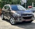 Коричневий Хендай іх35, об'ємом двигуна 1.7 л та пробігом 196 тис. км за 12900 $, фото 1 на Automoto.ua