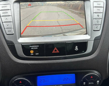 Коричневый Хендай их35, объемом двигателя 2 л и пробегом 180 тыс. км за 12300 $, фото 15 на Automoto.ua