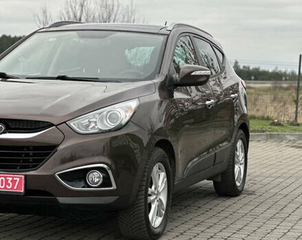 Коричневый Хендай их35, объемом двигателя 2 л и пробегом 209 тыс. км за 12200 $, фото 6 на Automoto.ua