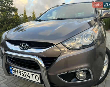 Коричневый Хендай их35, объемом двигателя 2 л и пробегом 136 тыс. км за 13999 $, фото 18 на Automoto.ua