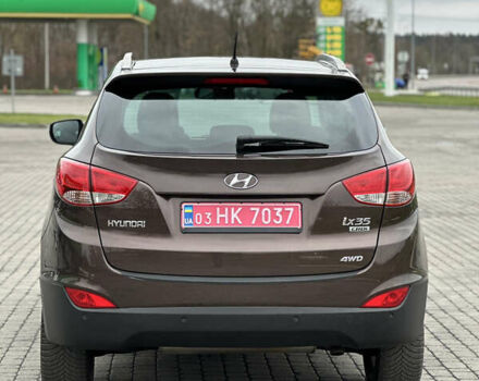 Коричневый Хендай их35, объемом двигателя 2 л и пробегом 209 тыс. км за 12200 $, фото 3 на Automoto.ua