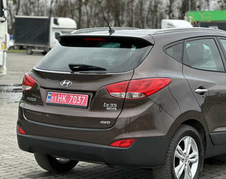 Коричневый Хендай их35, объемом двигателя 2 л и пробегом 209 тыс. км за 12200 $, фото 9 на Automoto.ua