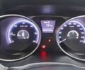 Коричневый Хендай их35, объемом двигателя 1.7 л и пробегом 309 тыс. км за 11500 $, фото 7 на Automoto.ua