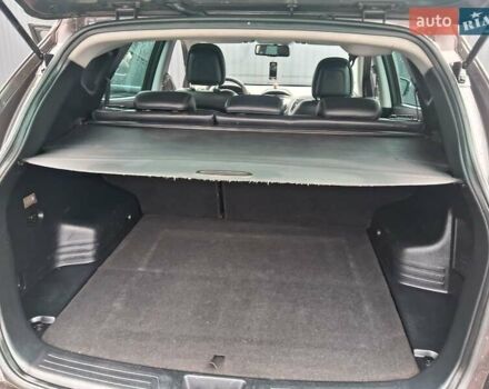 Коричневый Хендай их35, объемом двигателя 1.7 л и пробегом 309 тыс. км за 11500 $, фото 5 на Automoto.ua