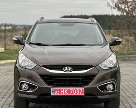 Коричневый Хендай их35, объемом двигателя 2 л и пробегом 209 тыс. км за 12200 $, фото 2 на Automoto.ua