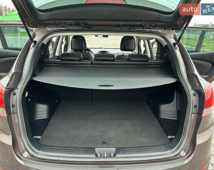 Коричневый Хендай их35, объемом двигателя 2 л и пробегом 209 тыс. км за 12200 $, фото 29 на Automoto.ua