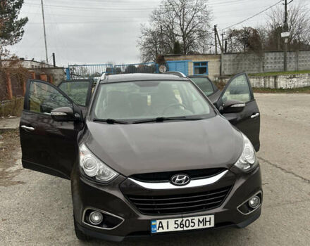 Коричневый Хендай их35, объемом двигателя 2 л и пробегом 180 тыс. км за 12300 $, фото 12 на Automoto.ua