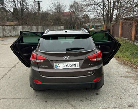 Коричневый Хендай их35, объемом двигателя 2 л и пробегом 180 тыс. км за 12300 $, фото 13 на Automoto.ua