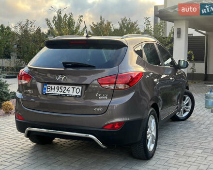 Коричневый Хендай их35, объемом двигателя 2 л и пробегом 136 тыс. км за 13999 $, фото 16 на Automoto.ua