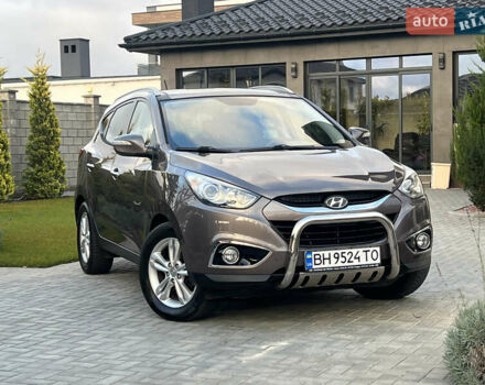 Коричневый Хендай их35, объемом двигателя 2 л и пробегом 136 тыс. км за 13999 $, фото 20 на Automoto.ua