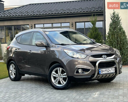 Коричневый Хендай их35, объемом двигателя 2 л и пробегом 136 тыс. км за 13999 $, фото 21 на Automoto.ua