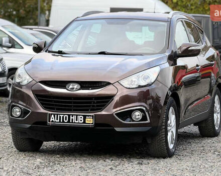 Коричневый Хендай их35, объемом двигателя 2 л и пробегом 216 тыс. км за 13900 $, фото 5 на Automoto.ua