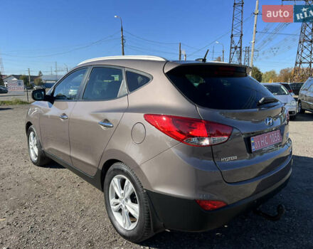 Коричневый Хендай их35, объемом двигателя 2 л и пробегом 184 тыс. км за 16450 $, фото 21 на Automoto.ua