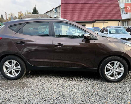 Коричневый Хендай их35, объемом двигателя 2 л и пробегом 216 тыс. км за 13900 $, фото 13 на Automoto.ua