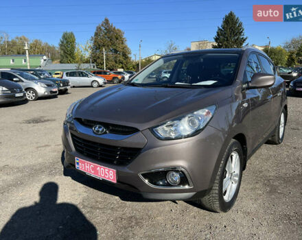 Коричневый Хендай их35, объемом двигателя 2 л и пробегом 184 тыс. км за 16450 $, фото 7 на Automoto.ua