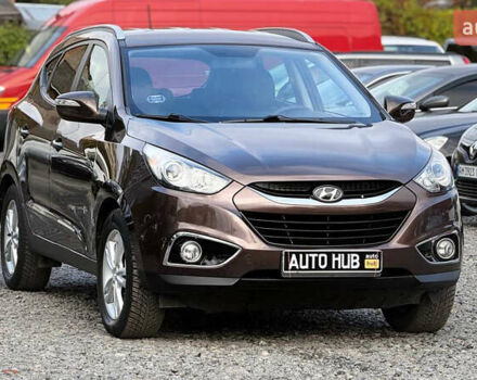 Коричневый Хендай их35, объемом двигателя 2 л и пробегом 216 тыс. км за 13900 $, фото 1 на Automoto.ua