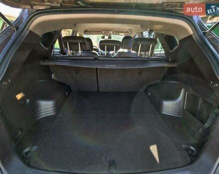 Коричневый Хендай их35, объемом двигателя 2 л и пробегом 115 тыс. км за 13000 $, фото 8 на Automoto.ua