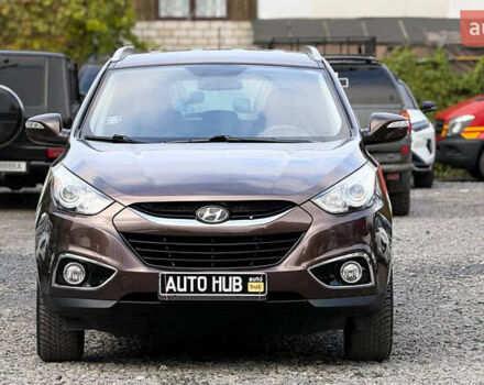 Коричневый Хендай их35, объемом двигателя 2 л и пробегом 216 тыс. км за 13900 $, фото 3 на Automoto.ua