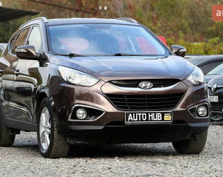 Коричневый Хендай их35, объемом двигателя 2 л и пробегом 216 тыс. км за 13900 $, фото 2 на Automoto.ua