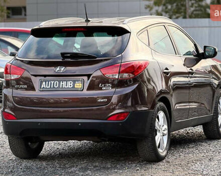 Коричневый Хендай их35, объемом двигателя 2 л и пробегом 216 тыс. км за 13900 $, фото 11 на Automoto.ua