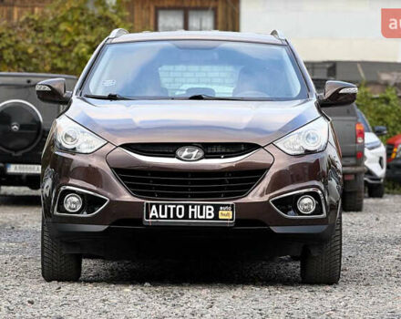 Коричневый Хендай их35, объемом двигателя 2 л и пробегом 216 тыс. км за 13900 $, фото 4 на Automoto.ua